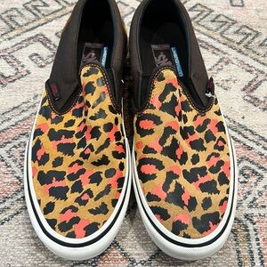 Men Vans Punk Slip-On Pro skate shoes featuring a leopard print, UltraCush Sz 11
